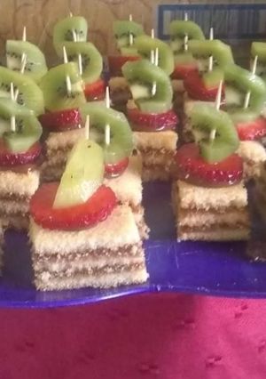 Una foto de Pionono con dulce leche (pionono comprado)
