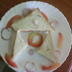A picture of Bread,Tomatoes and Onion.