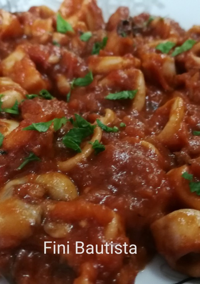 Una foto de Calamares en salsa americana