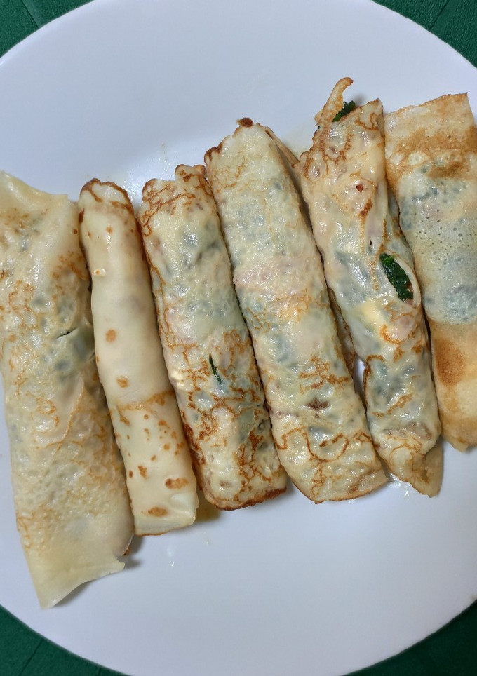 Una foto de Crepes rellenos de espinacas