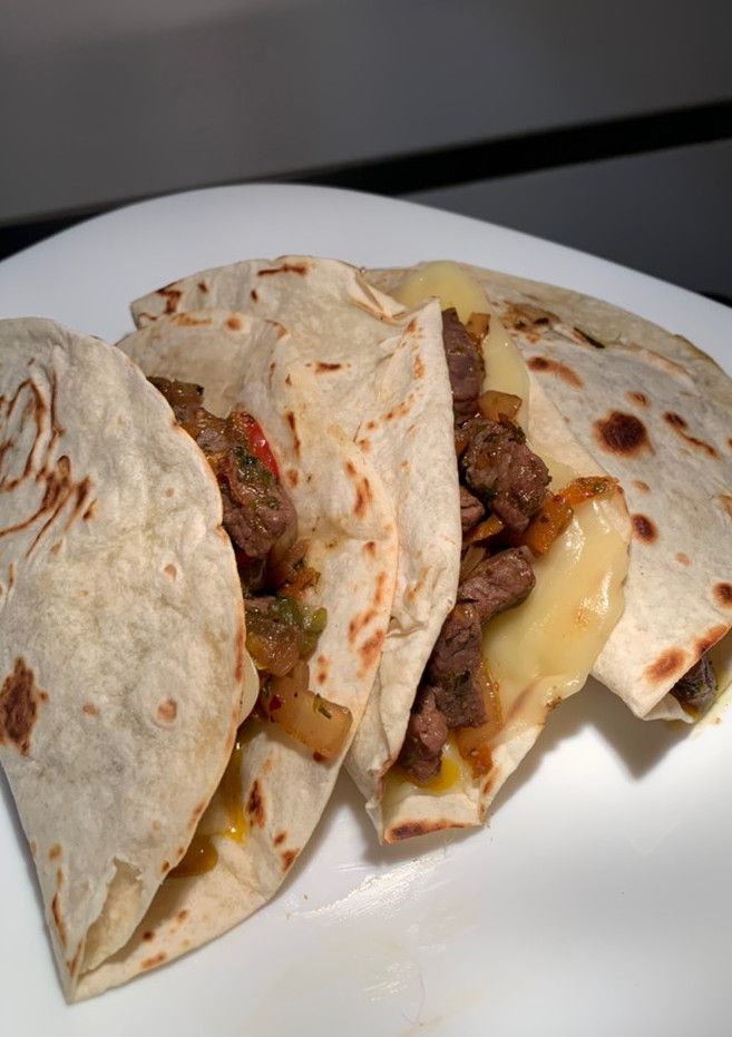 Una foto de Tacos de carne 🌮