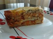 Una foto de pasta rellena ricota y espinaca