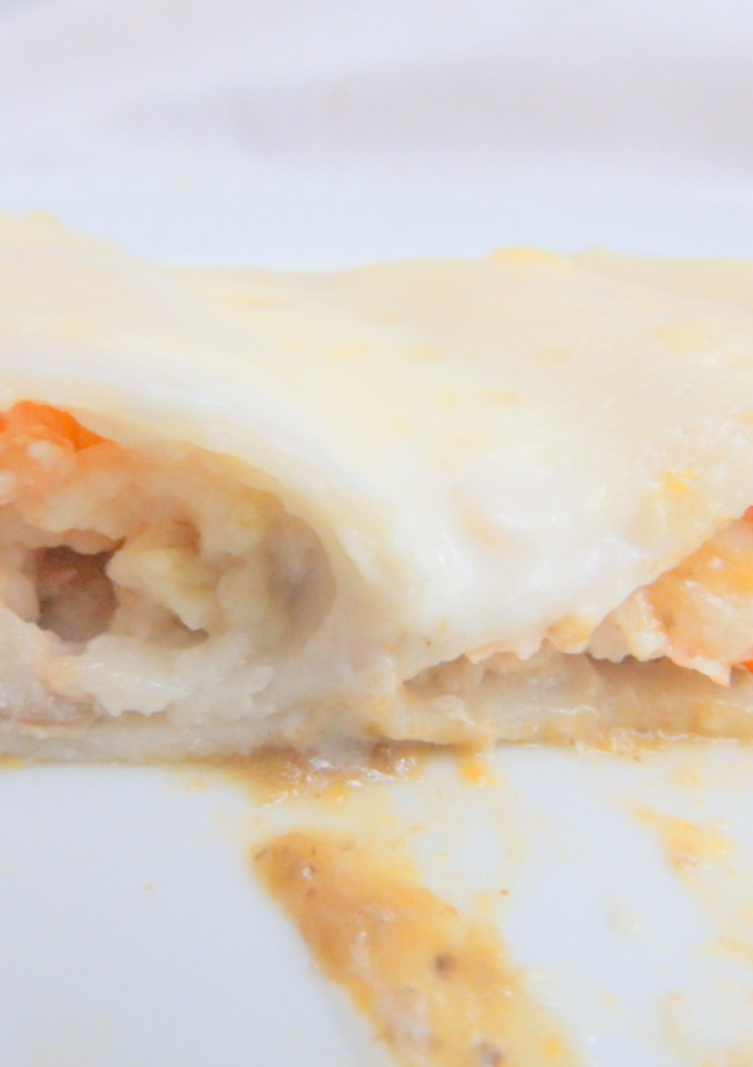 Una foto de Canelones de pescado al culis de boletus y parmesano