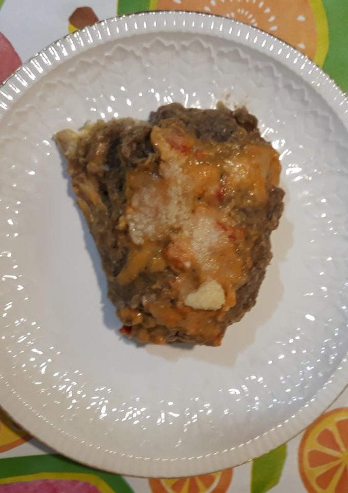 Una foto de Calabacín relleno de berenjena, pavo y queso