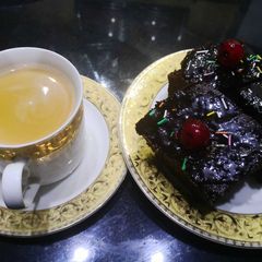 A picture of Microwave Brownies with chocolate glazed.