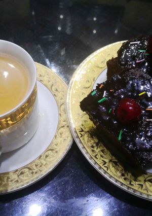A picture of Microwave Brownies with chocolate glazed.