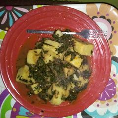 Yam with vegetable(ugu) A picture of Yam with vegetable(ugu).