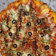Chicken Tikka Pizza A picture of Chicken Tikka Pizza.