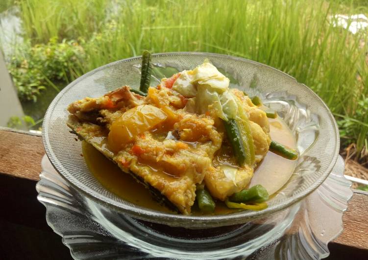 Ikan patin bumbu kuning pedas