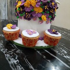 Butter Cake Covered in fondant With Royal icing flowers A picture of Butter Cake Covered in fondant With Royal icing flowers.