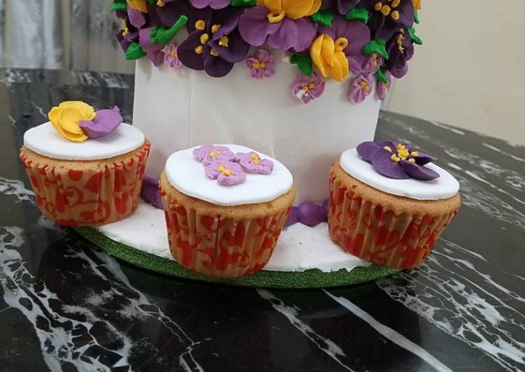 Butter Cake Covered in fondant With Royal icing flowers