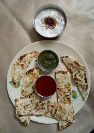 A picture of Punjabi butter paneer stuff kulcha.