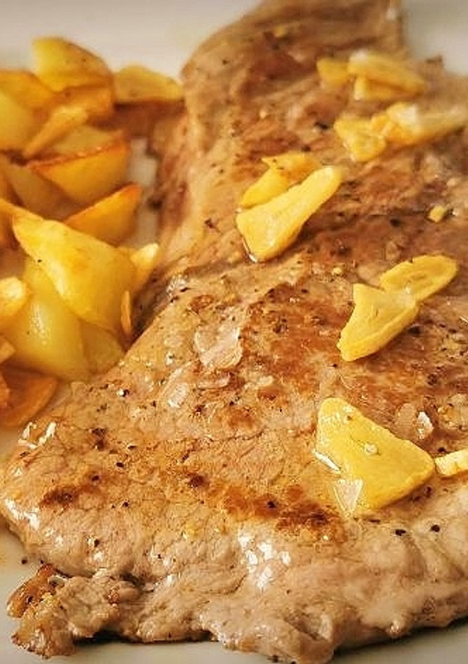 Una foto de Filete de Ternera plancha al ajillo