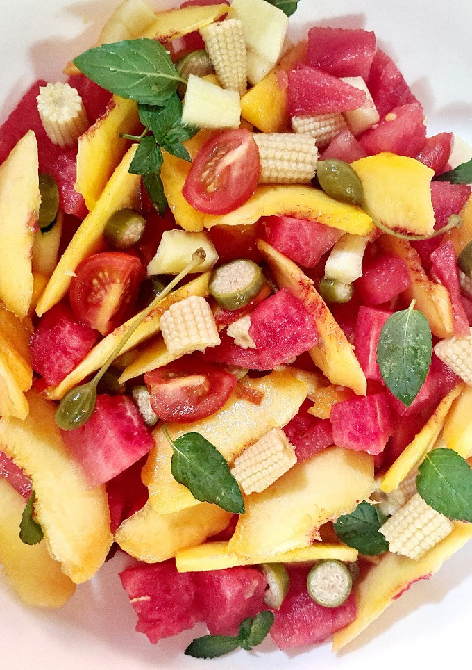 Una foto de Ensalada colorida con vinagreta de miel y cítricos
