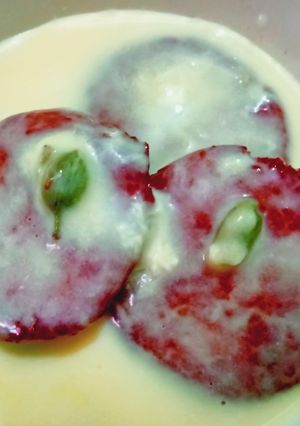 A picture of Sweet rashbhari with custard milk.