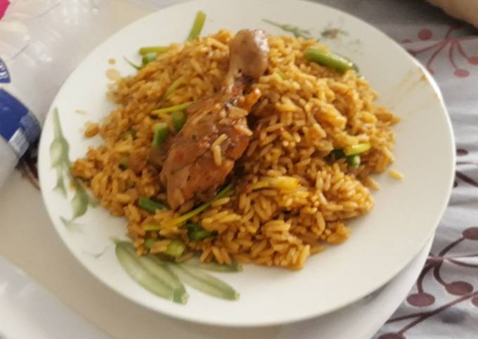 Jollof rice with spring onion and chicken Recipe