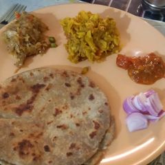 A picture of Bajra sooji curd paratha.