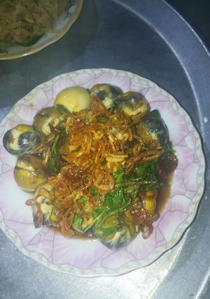 Hình của món Cút lộn xào me.