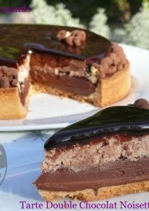 Une photo de Tarte Double Chocolat Noisette Tonka et Noix