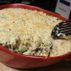 A picture of Alfredo casserole with spinaches, mushroom and broccoli.