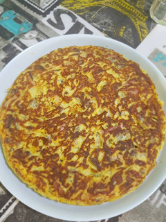 Una foto de Tortilla de carne y beicon
