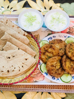 A picture of Aloo kabab with roti.