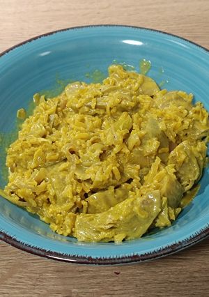 Foto principal de Arroz meloso con alcachofas al camembert con especias orientales