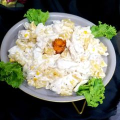 A picture of Chicken and pineapple salad.