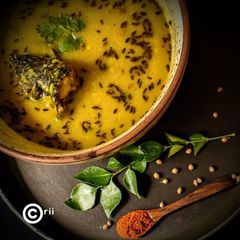 Moong Dal with fish head-Mach ER matha diye dal A picture of Moong Dal with fish head-Mach ER matha diye dal.