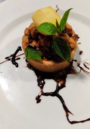 Una foto de 🥮Tarta de manzana Criolla 🍏y nuez..