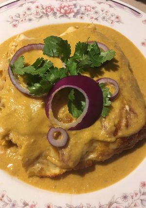 Una foto de Enchiladas suizas rojas