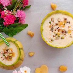 A picture of Musk melon 🍈 ice cream shake with nuts.