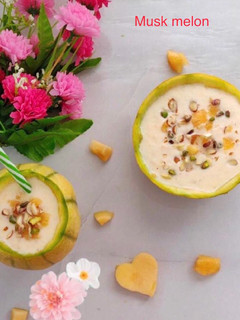 A picture of Musk melon 🍈 ice cream shake with nuts.