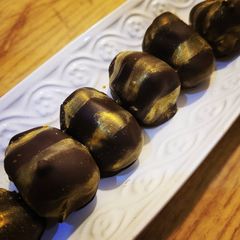 A picture of Chocolate dates with cream.