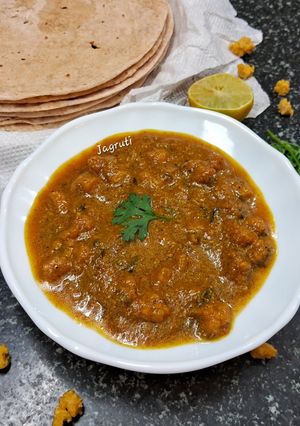 A picture of Moong Dal Vadi Rassa !!.