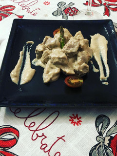 Una foto de Magro de cerdo con salsa de champiñones
