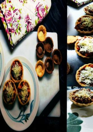 A picture of A break to sweet tooth. Tangy and Cheesy Mini Savoury Corn Tarts.