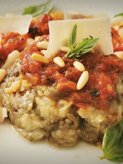 Una foto de Melanzane alla parmigiana (Berenjenas a la parmesana)