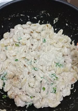 A picture of Penne Alfredo pasta.