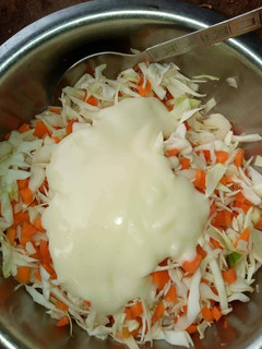 A picture of Coleslaw with mayonise.