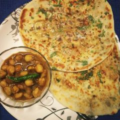 Amritsari Aloo Kulcha and Punjabi Chole A picture of Amritsari Aloo Kulcha and Punjabi Chole.