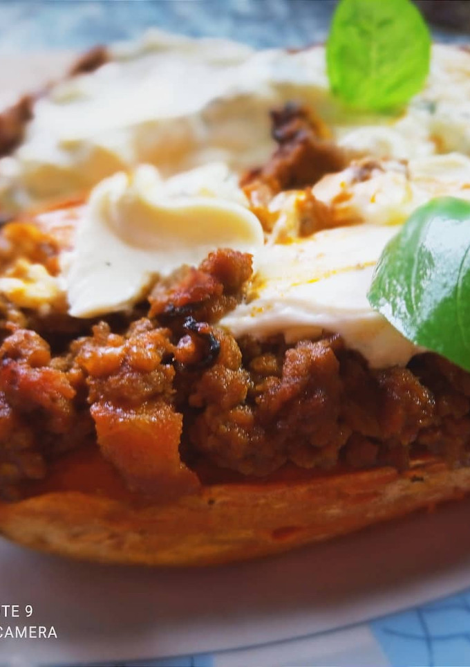 A picture of Sweet Potato Boats with Cream Cheese Sauce with Mint and Lime.