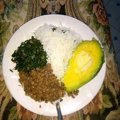 A picture of Plain rice with kamande en kales.