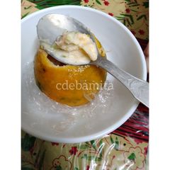 A picture of Orange Kulfi in orange shell.