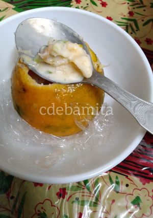 A picture of Orange Kulfi in orange shell.