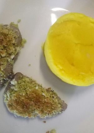A picture of Pork medallions with garlic and herb crust with saffron mash.