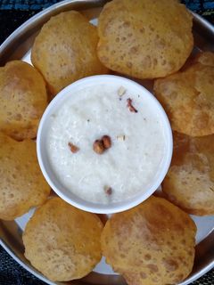 ખીર - પૂરી (Kheer Puri Recipe In Gujarati) રેસીપી મુખ્ય ફોટો