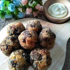 A picture of Aubergine and Mushroom Balls.
