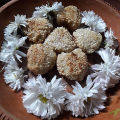 Sesame seeds semolina pitha A picture of Sesame seeds semolina pitha.