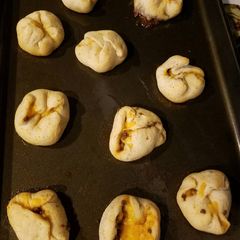 A picture of Taco stuffed biscuits with Taco Butter.